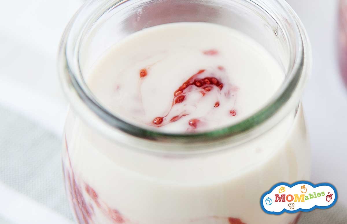 small glass jars of yogurt and fruit