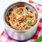 spaghetti carbonara in a metal thermos lunch