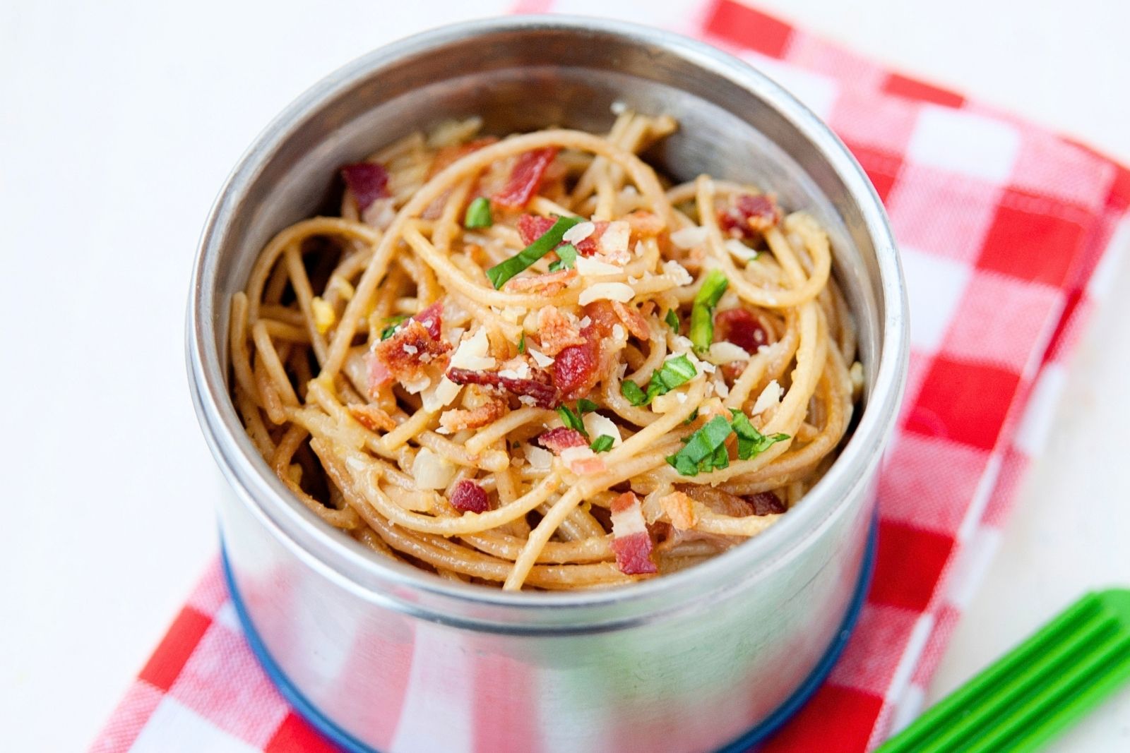 spaghetti carbonara in a metal thermos lunch