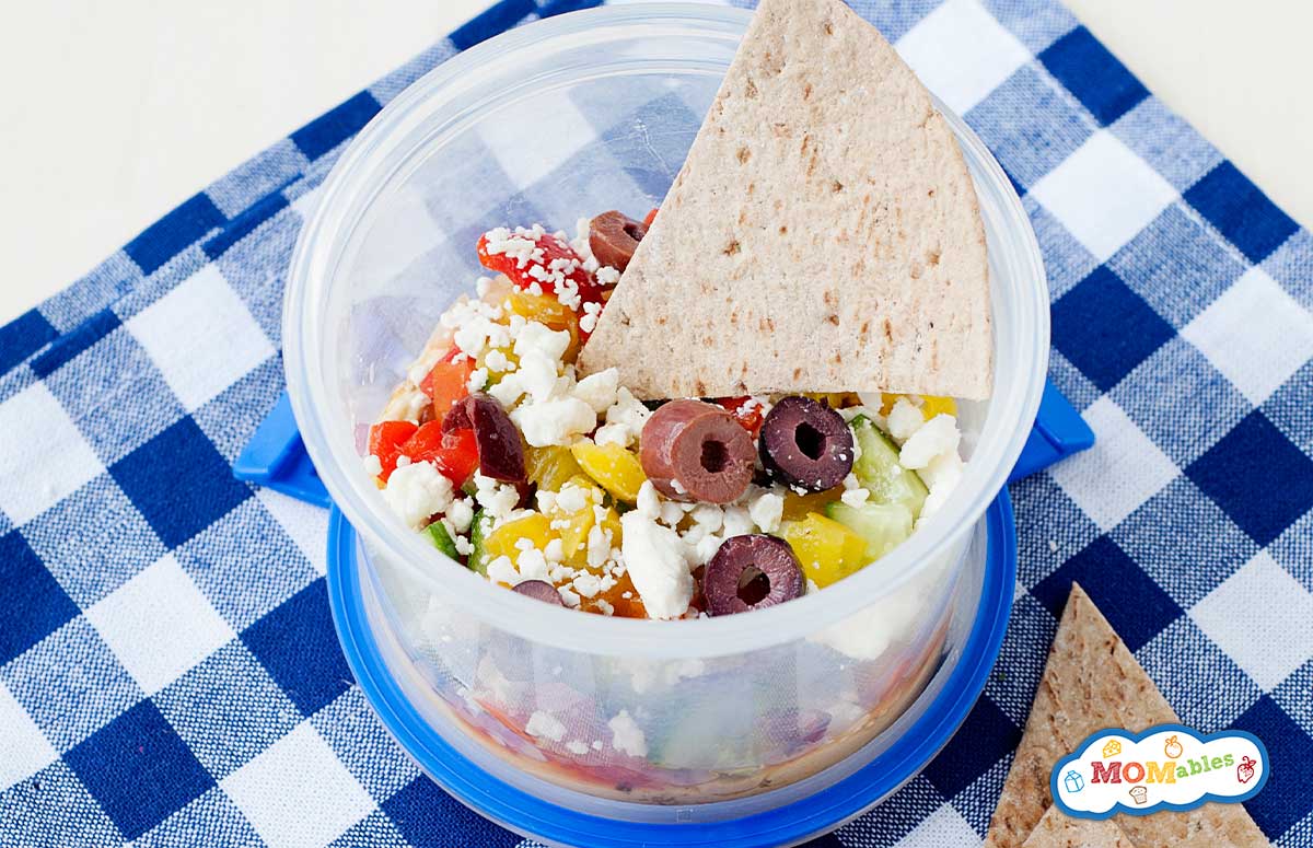 7 Layer Greek Dip in a lunch container
