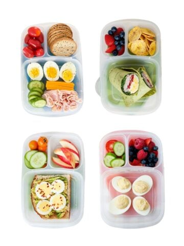 four school lunches made with hard boiled eggs floating in a white background