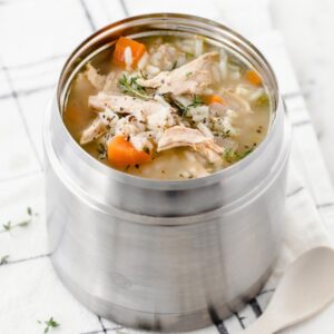 chicken and rice soup in a metal thermos