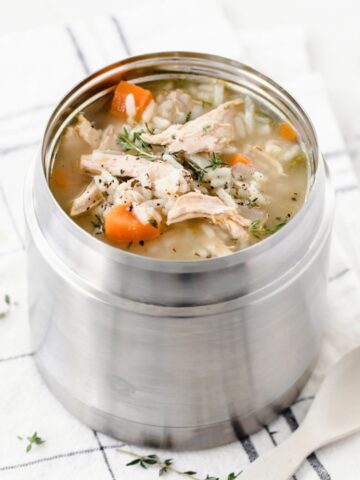 chicken and rice soup in a metal thermos