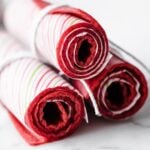 three rolls of strawberry fruit leather