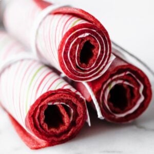 three rolls of strawberry fruit leather