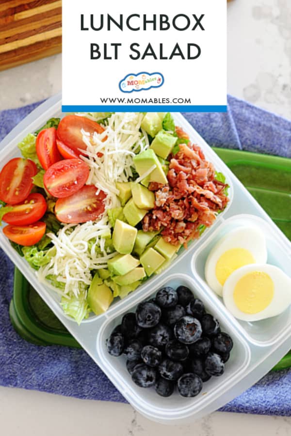 image: BLT salad in a lunchbox container. Included in the container is sliced boiled eggs and blueberries. 

Image text reads: Lunchbox BLT Salad
