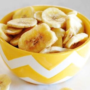 banana chips in a yellow bowl