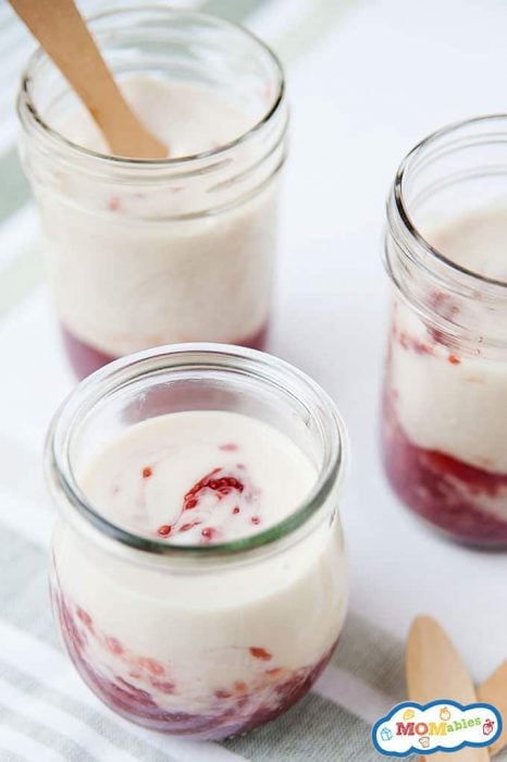 small glass jars of yogurt and fruit