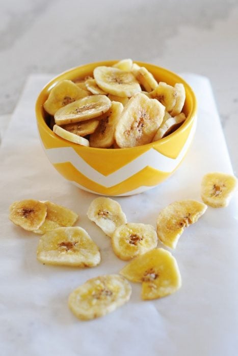 banana chips in a yellow bowl