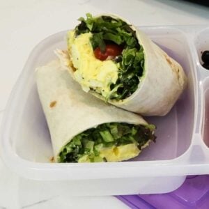 egg salad wrap in a lunch container