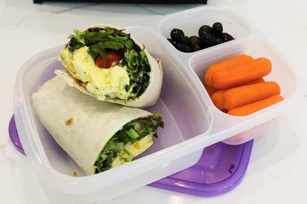 egg salad wrap in a lunch container