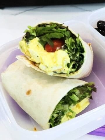 egg salad wrap in a lunch container