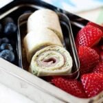 turkey pesto pinwheels and berries in a lunchbox