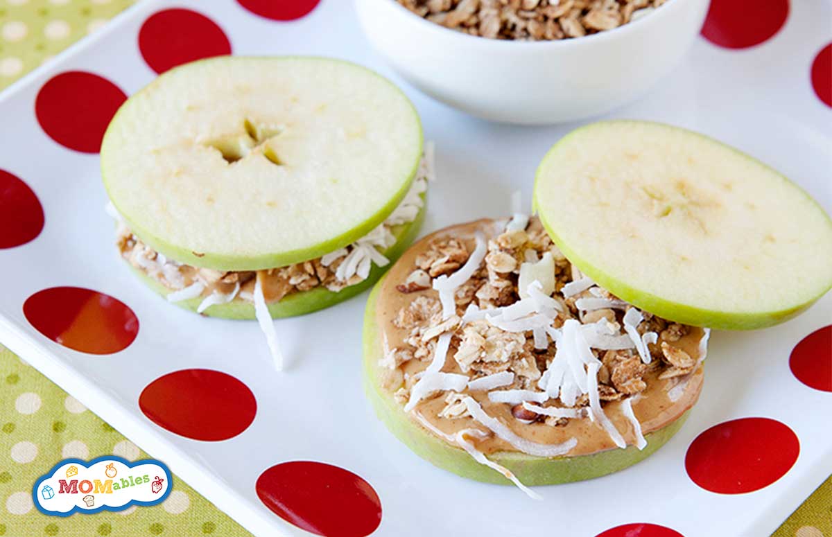 two apple sandwiches on a tray
