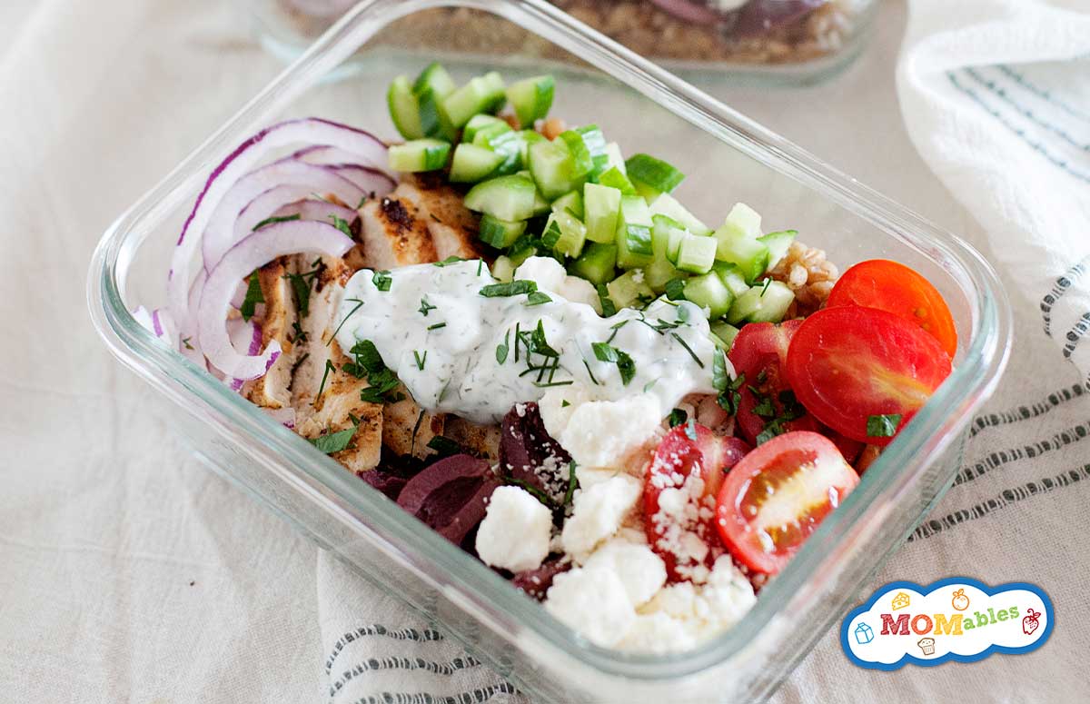 a school lunch bowl with chicken, farro, and veggies