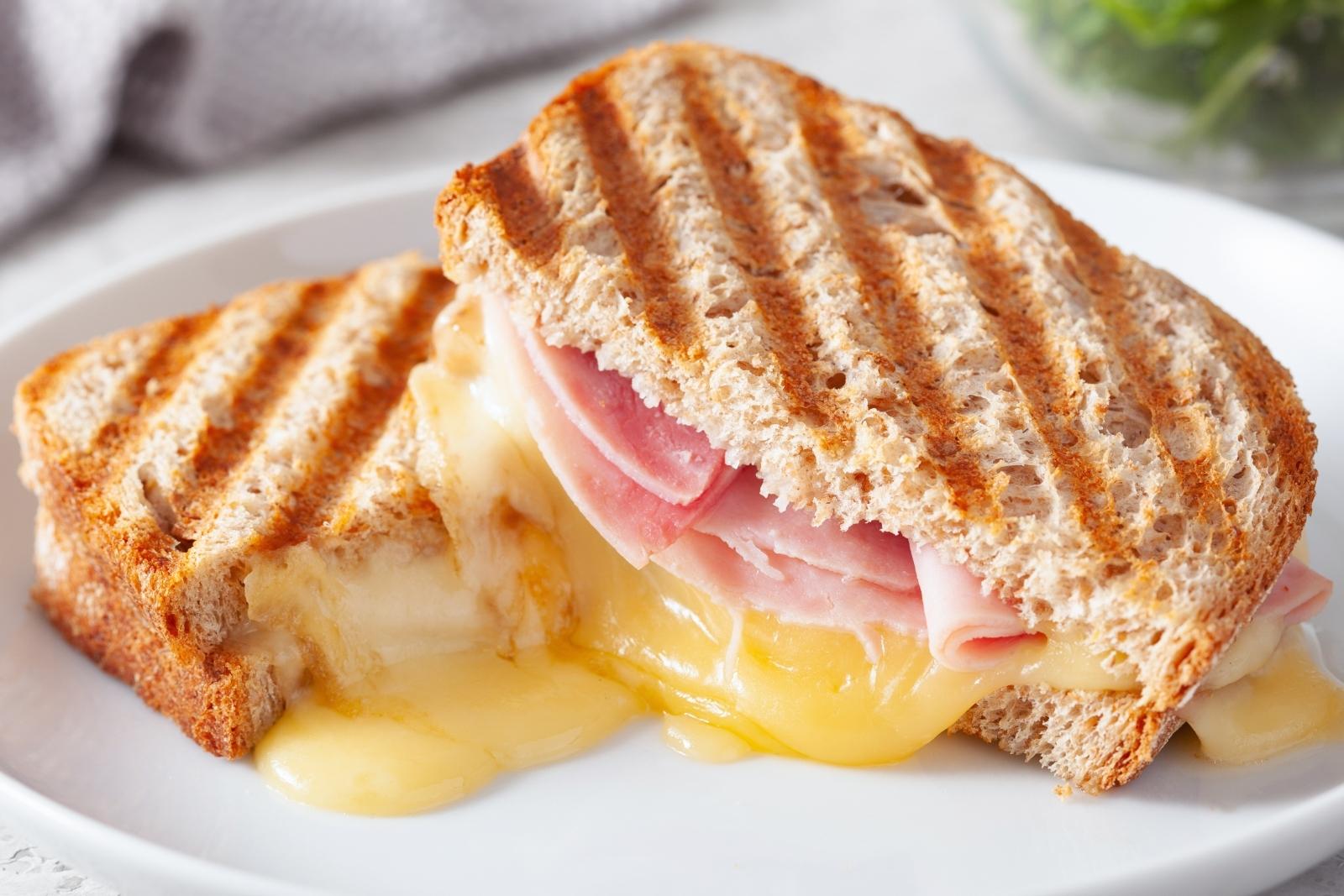 grilled ham and cheese sandwich cut in half