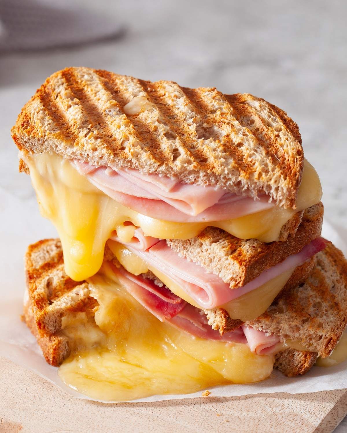 grilled ham and cheese sandwich cut in half