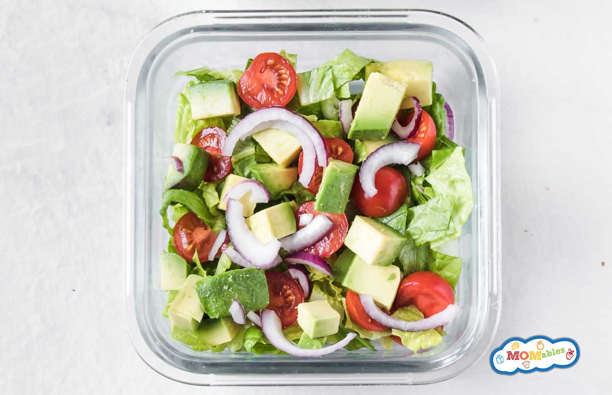 tomato and avocado salad in a lunch container