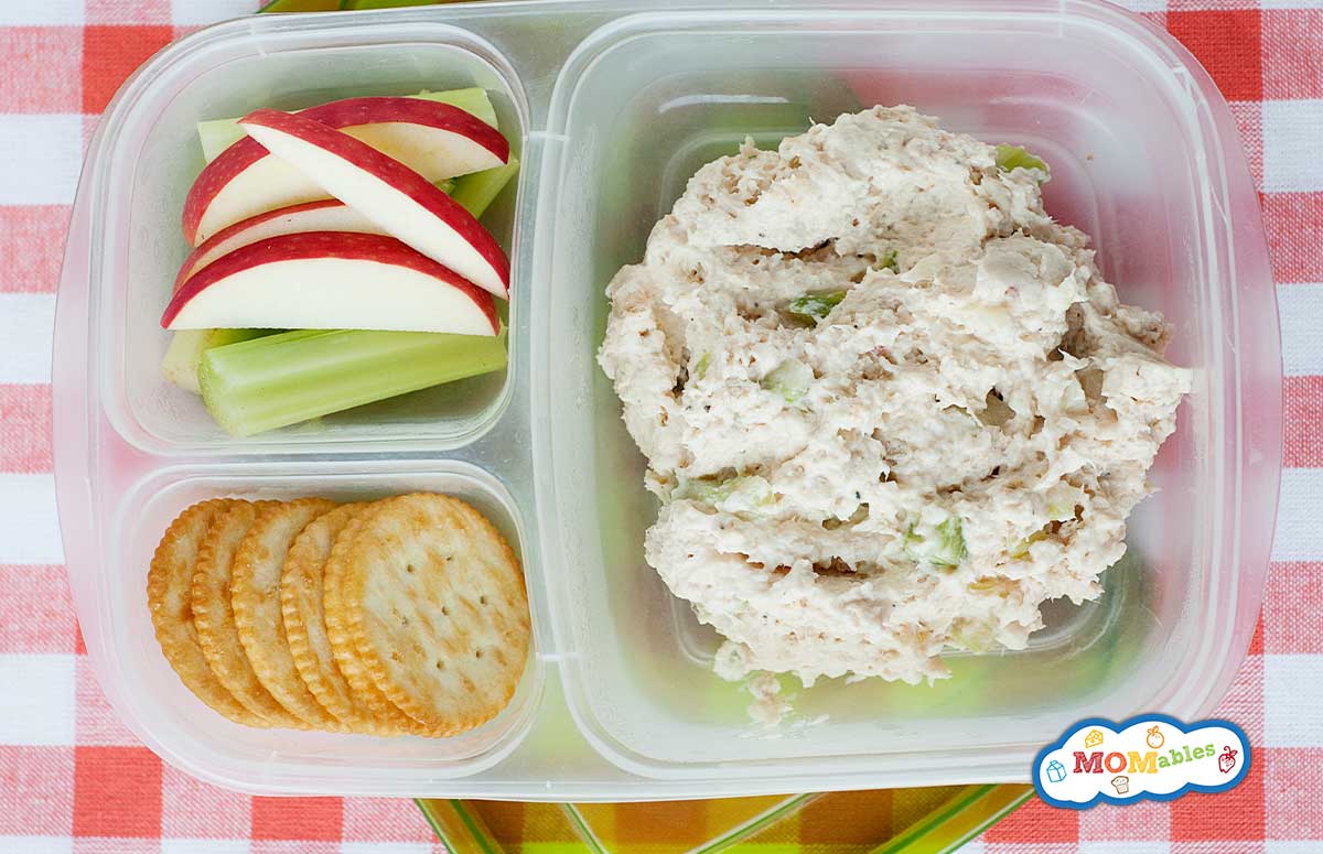 chicken salad lunchbox with crackers and apples