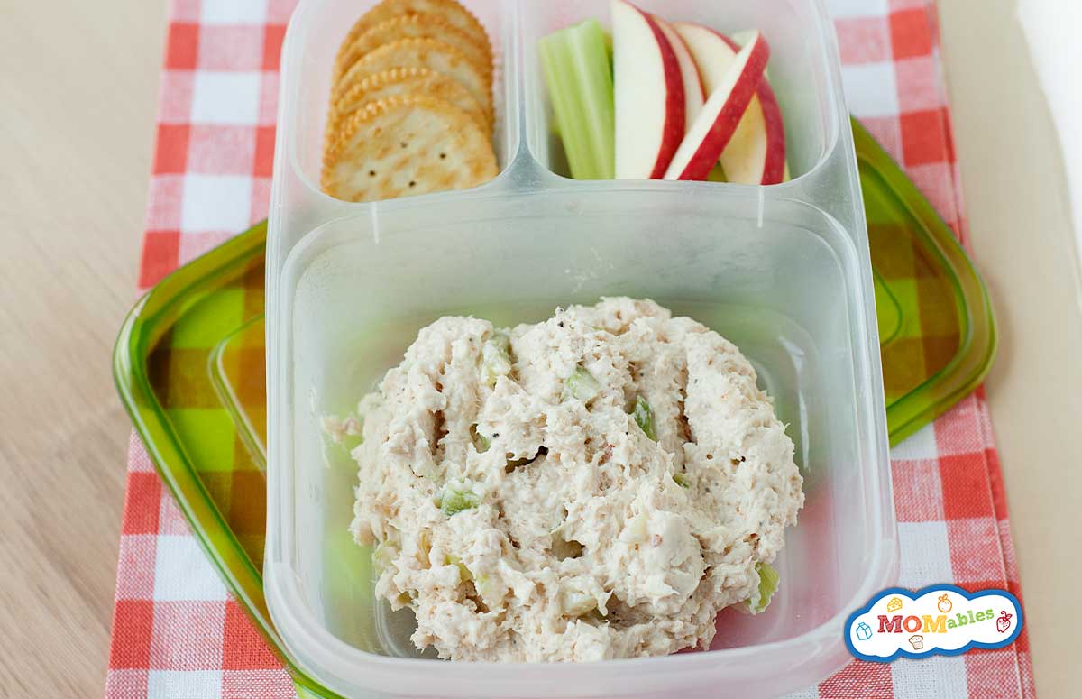 chicken salad lunchbox with crackers and apples