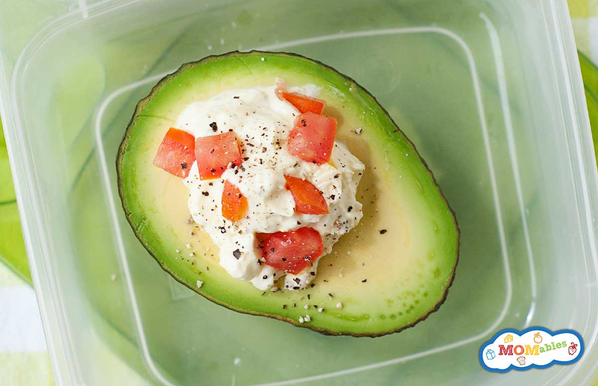 half a stuffed avocado stuffed with avocado 