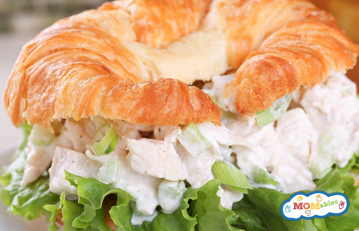 closeup of a chicken salad croissant with lettuce