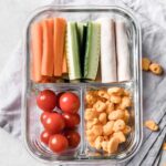 a small snack container with turkey, veggies and snacks