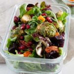 salad with roasted vegetables and pomegranate seeds