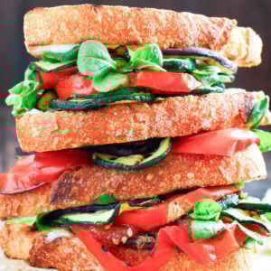two grilled veggie sandwiches, stacked together