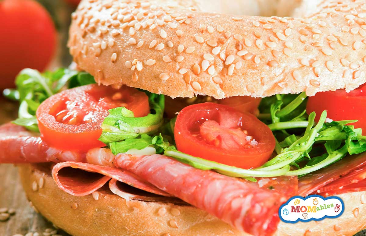 salami, tomato and lettuce bagel sandwich