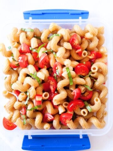 tomato pasta salad in a school lunch container