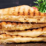stack of four gouda grilled cheese sandwich halves