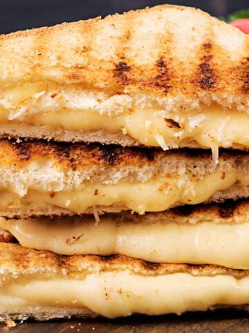 stack of four triangle gouda grilled cheese halves