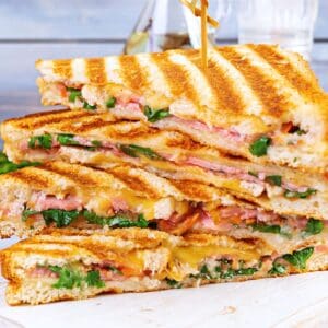 grilled sandwich with ham, cheese tomatoes and spinach