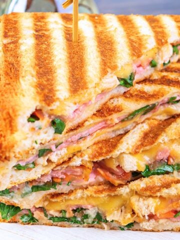 grilled sandwich with ham, cheese tomatoes and spinach