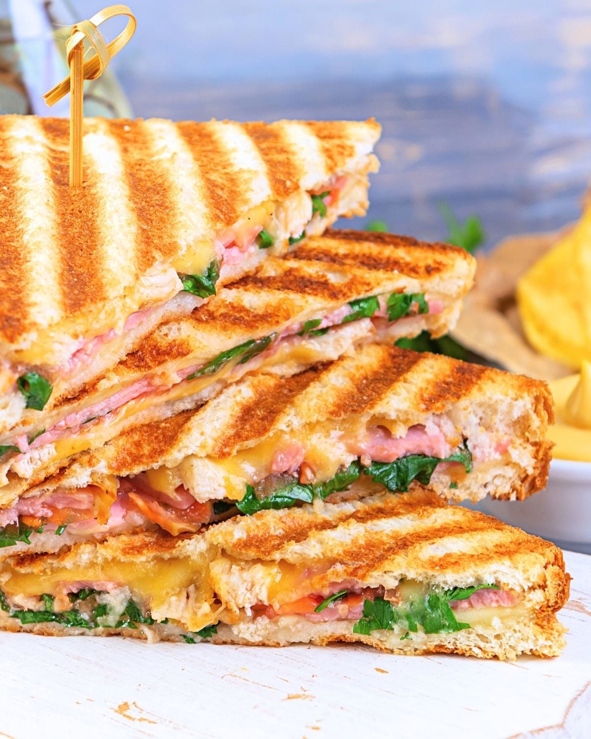 grilled sandwich with ham, cheese tomatoes and spinach