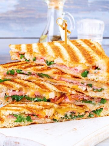 grilled sandwich with ham, cheese tomatoes and spinach