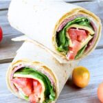 an italian sandwich wrap cut in half and stacked