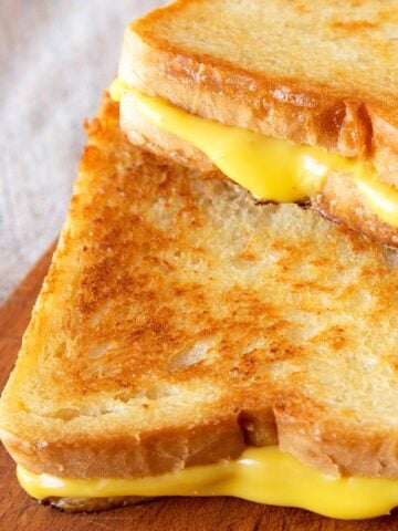 two grilled cheese sandwiches