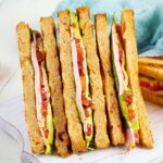 three club sandwiches stacked
