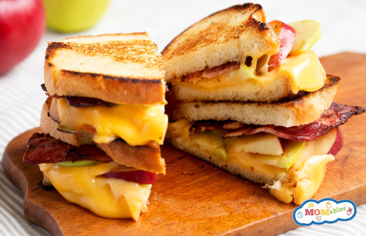 bacon apple grilled cheese slikced in half
