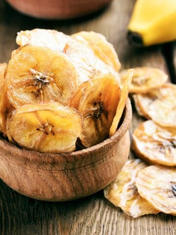 banana chips in a small brown bowl
