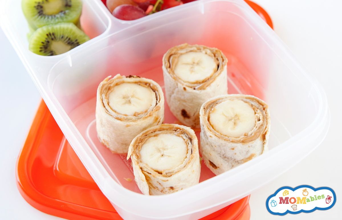 four banana sushi rolls in a lunchbox